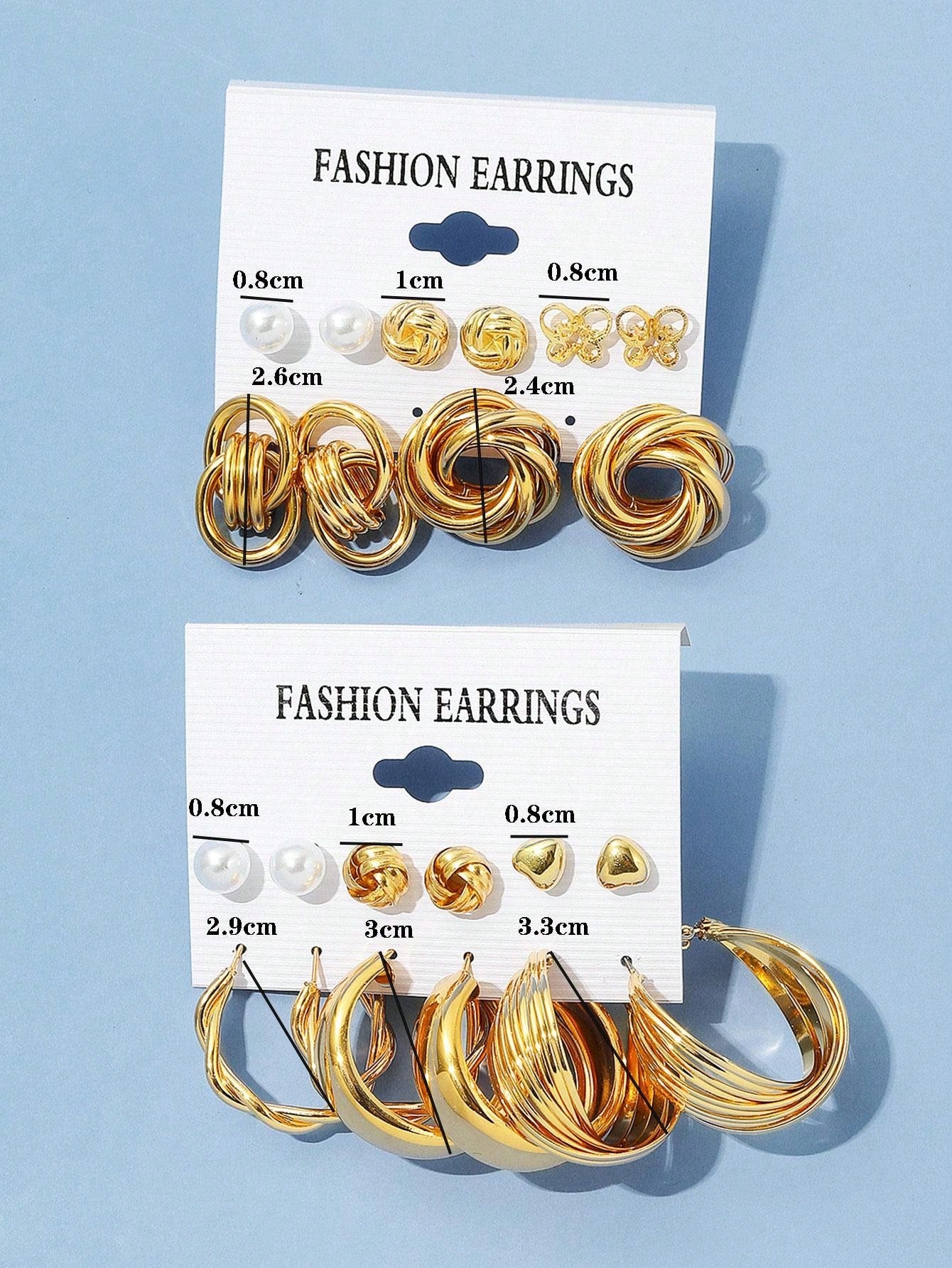 Set of gold and pearl fashion earrings featuring various styles including hoops, knots, hearts, and twists. Displayed on a card labeled 'FASHION EARRINGS' for easy selection and gifting.