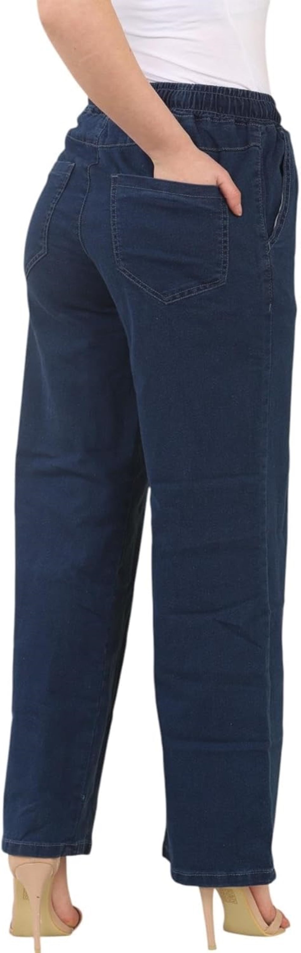 blue wide-leg pants with elastic waistband and pockets, paired with a white tank top and beige high-heeled sandals