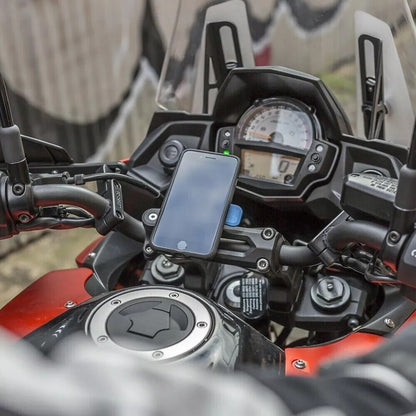 Phone holder attached to motorcycle handlebar