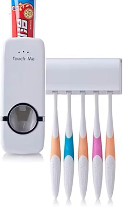 Automatic toothpaste dispenser with touch-activated technology mounted on a bathroom wall