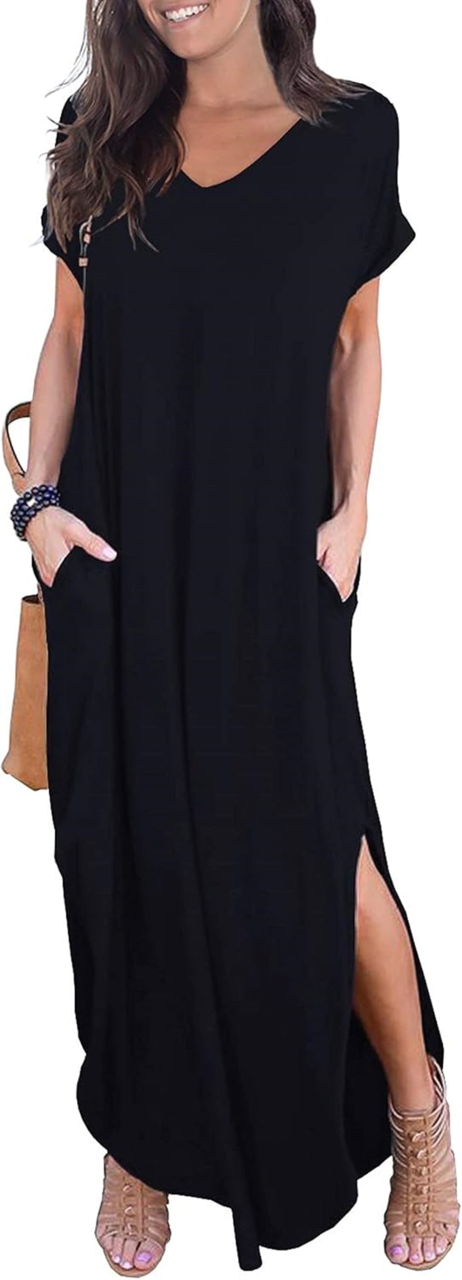 Model wearing a black V-neck, short-sleeved Maxi dress with a side slit.