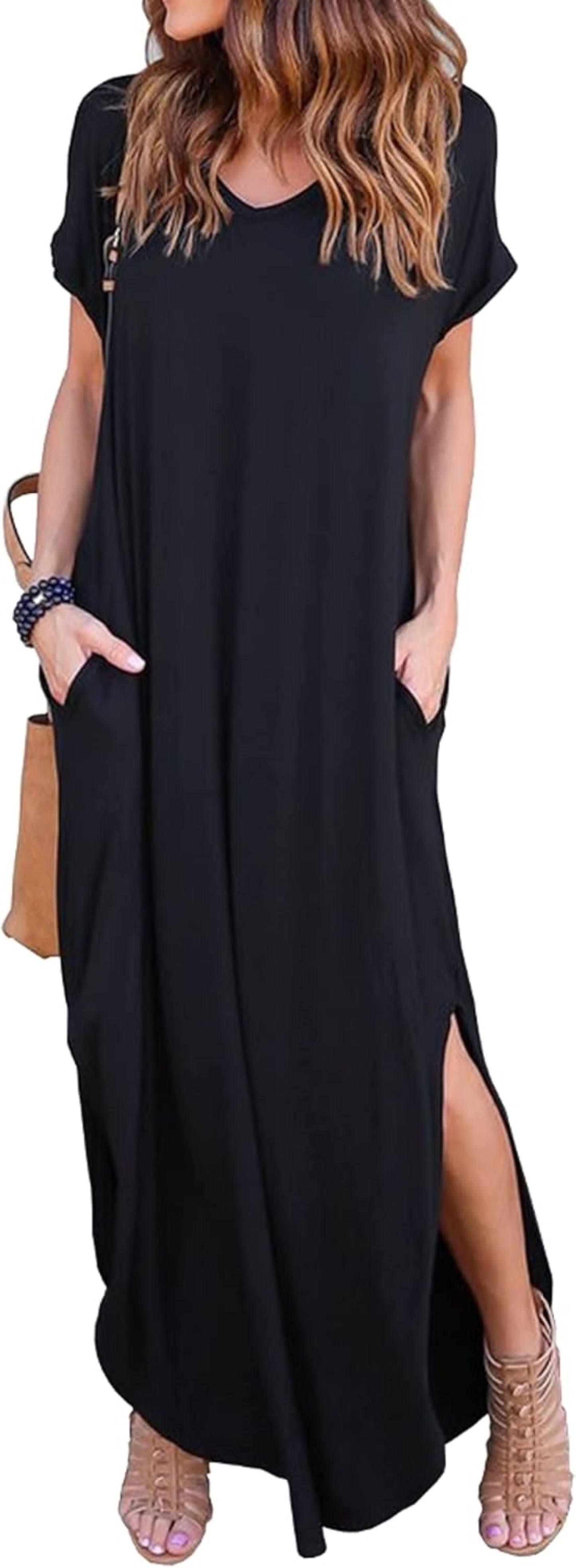 Model wearing a black V-neck, short-sleeved Maxi dress with a side slit.