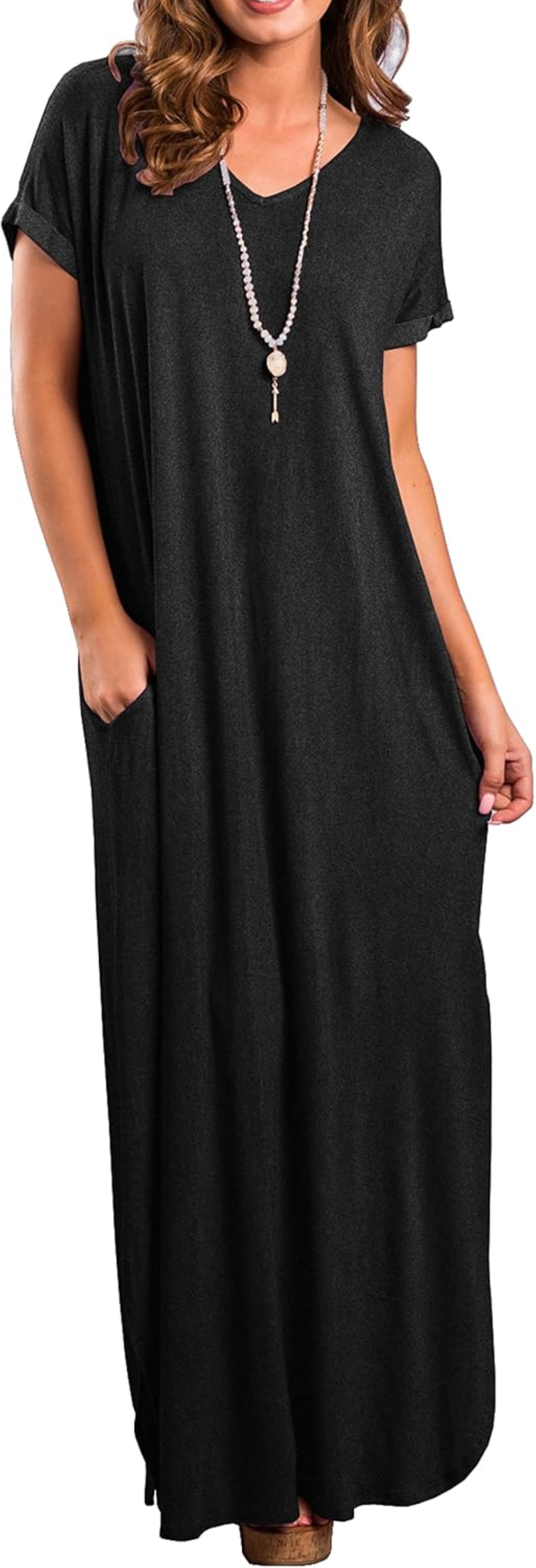 Model wearing a black, short-sleeved maxi dress with a V-neckline and side slit.