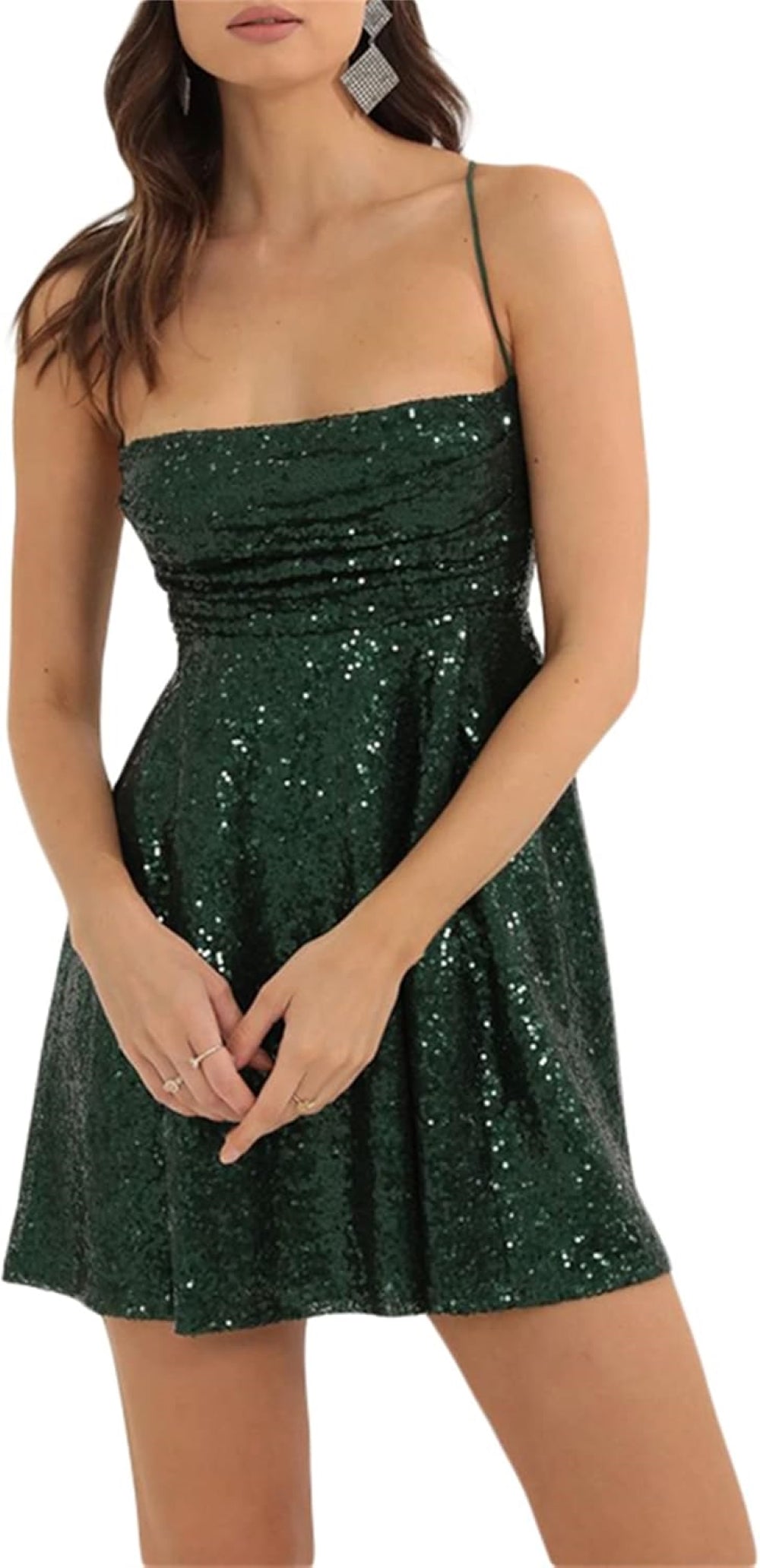 dark-Green mini dress with a sweetheart neckline, thin spaghetti straps, fitted bodice, and flared skirt. Paired with statement earrings and rings. Shown against a plain background.