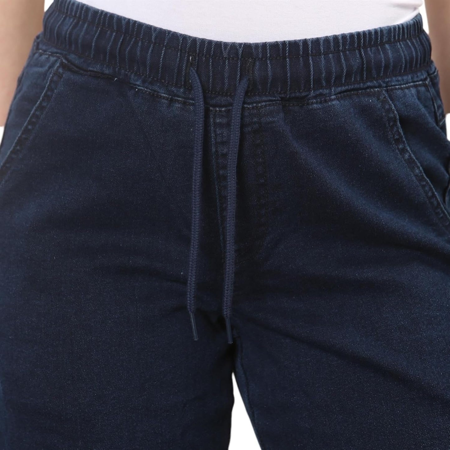 Dark Stonewash wide-leg pants with elastic waistband and drawstring, showing detail of the waistband and front pockets.
