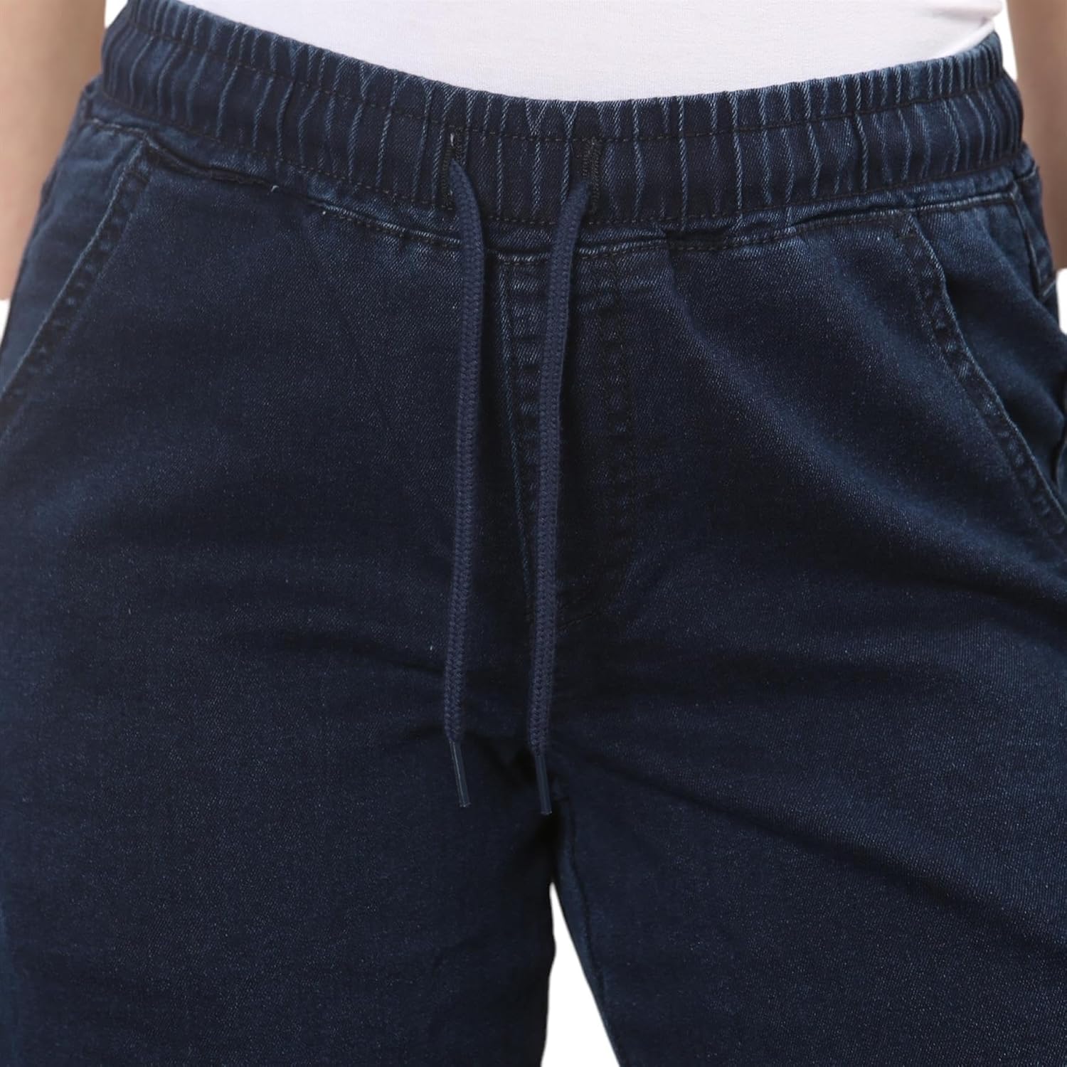 Dark Stonewash wide-leg pants with elastic waistband and drawstring, showing detail of the waistband and front pockets.