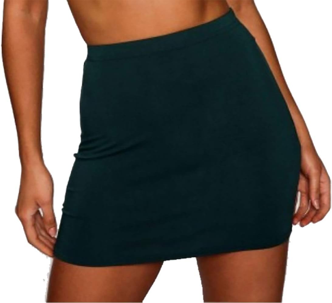 Green mini skirt with smooth fabric and elastic waistband. Simple, form-fitting design for casual and formal wear.