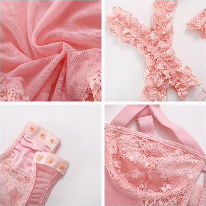 Pink lace lingerie bodysuit with floral lace panels, adjustable shoulder straps, ruffled hem, matching garter belt, and lace trim. Feminine design with a keyhole cutout and delicate detailing.
