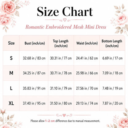 A size chart graphic for a romantic embroidered mesh mini dress, showing measurements in inches & centimetres for sizes S, M, L, and XL, with floral corner decorations and the title 'Size Chart' at the top.